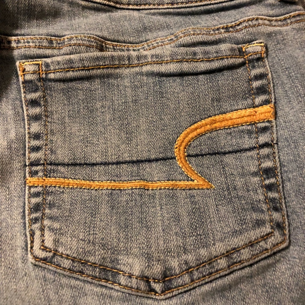 AE  artist destructed Jeans